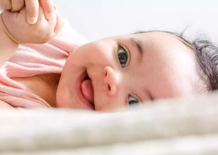Spiritual Meaning Behind Babies Laughing in Their Sleep
